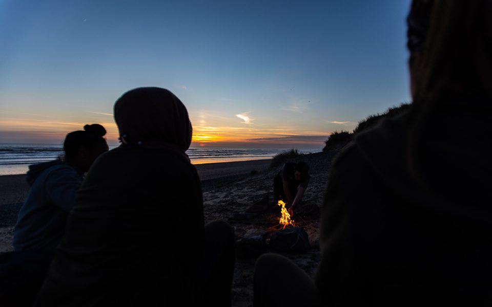 15-things-Outward-Bound-Campfire-beach-sunset