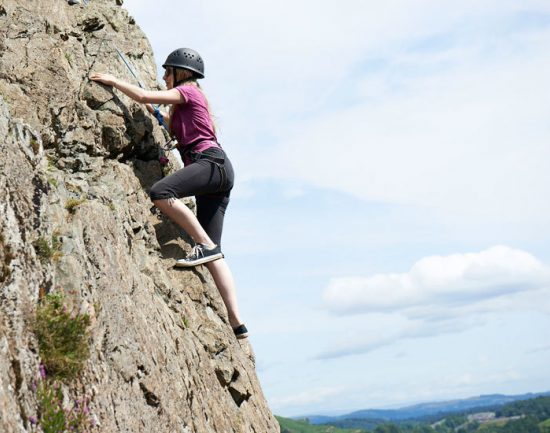 Girl-rock-climbing-landing-700x550