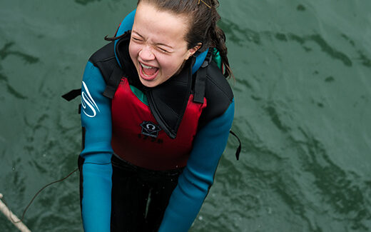 SA_Aberdovey_girl_jetty_jump_520x520